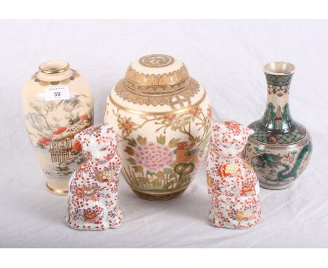 A Japanese Satsuma ginger jar and cover with floral and bird decoration, a similar vase with landscape decoration, an earthen