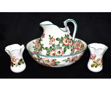 WEMYSS WARE:  a large bulbous jug painted with roses, impressed and painted 'Wemyss' to base and oval Thomas Goode stamp, 26c