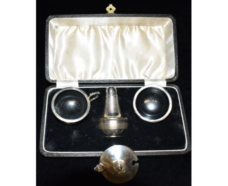 SILVER CRUET SET IN PRESENTATION BOX Consisting of pepper shaker, salt cellar and mustard pot, with engine turned decoration.