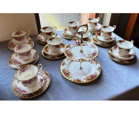 ROYAL ALBERT: A COLLECTION OF 'OLD COUNTRY ROSES' AND 'AUTUMN ROSES' TEAWARES:  nine tea plates, seven tea cups and saucers, 