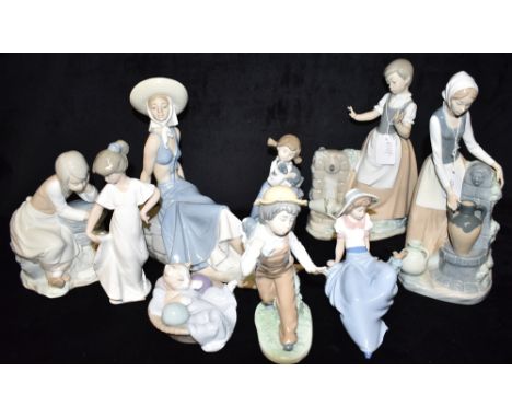 A GROUP OF NINE NAO FIGURES:  model 136 Girl at the Fountain, model 10137 Sad Milk Maid, model 228 Girl Reclining, and five o