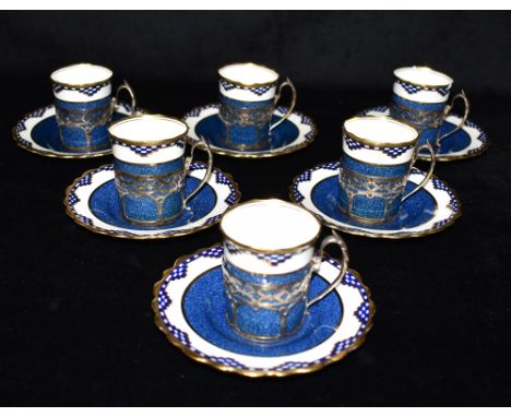 A SET OF SIX SILVER MOUNTED AYNSLEY COFFEE CANS AND SAUCERS  the silver hallmarked Sheffield 1930 Condition Report : saucers 