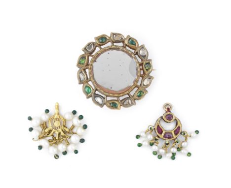 A gem-set gold forehead pendant (chand-tikka), a gem-set gold mirrored roundel and a pearl-mounted gold pendant from the coll