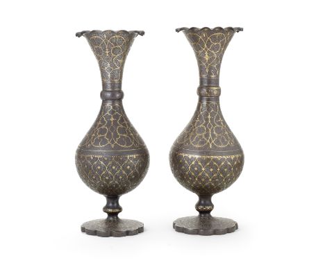 A pair of Qajar gold-damascened steel vases Persia, 19th Centuryeach of baluster form with broadly flaring neck and flattened