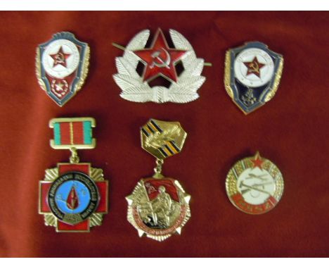 Cold War Era Russian Badges, including Chernobyl medal, Army excellence badge, 25 year anniversary badge of end of WWII etc.