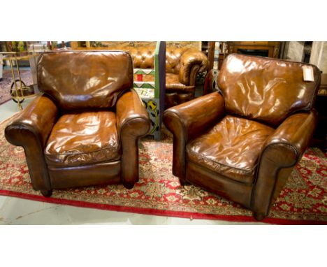 CLUB ARMCHAIRS, a pair, vintage hand finished, tan brown leather, with rounded arms, 90cm W. (2)