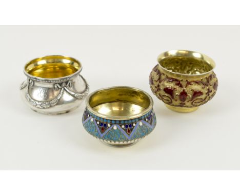 RUSSIAN SALTS, three various, all hallmarked silver, two gilt and enamel, the other with laurel swag decoration, 5.5cm diam. 