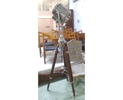 TRIPOD STAGE LAMP, polished metal on extendable wood tripod base, 176cm H.