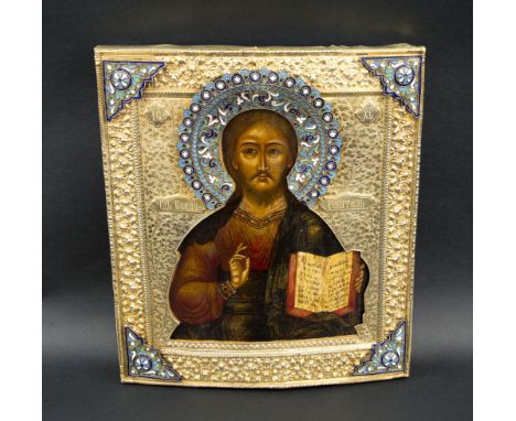 RUSSIAN ICON, early 20th century, the silver gilt and enamel embellished oklad with Moscow hallmarks, 32cmH x 27cmW.