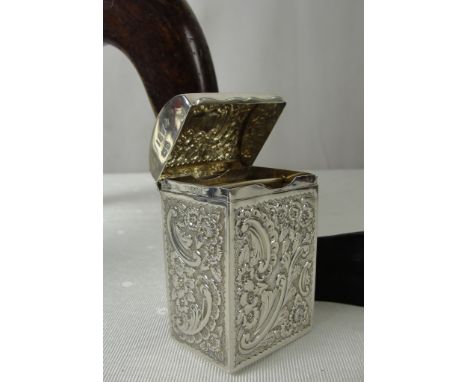 A Victorian Silver Playing Card Casket:
with floral embossed pattern and arched top lid,engraved with "1874 1899" to the side