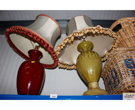 A large Italian table lamp with shade together with a red glazed table lamp and shade of baluster form