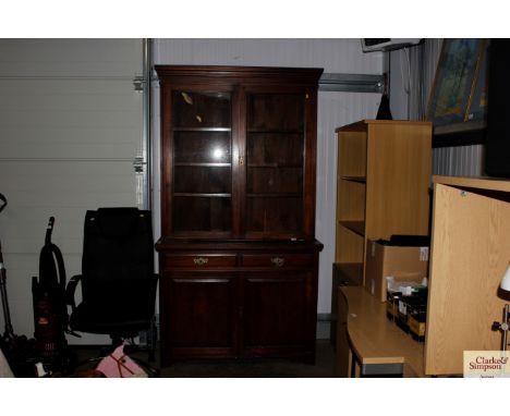 A 19th Century display cabinet raised on cupboard base fitted two drawers