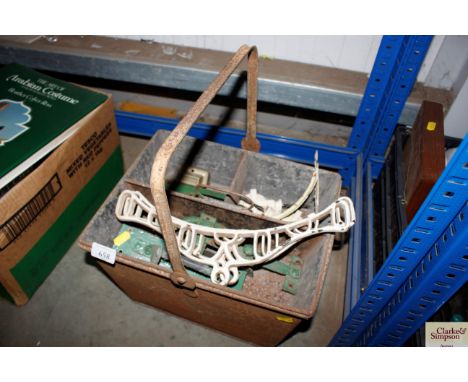 A metal trug bucket containing wall brackets; door fittings etc