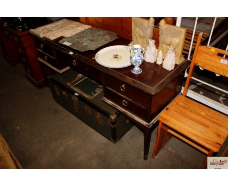 A Stag writing desk fitted five drawers