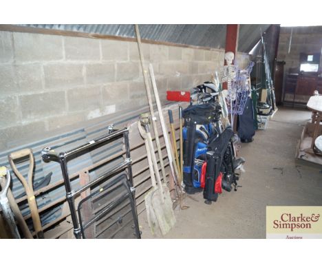 A quantity of gardening tools and two malt shovels