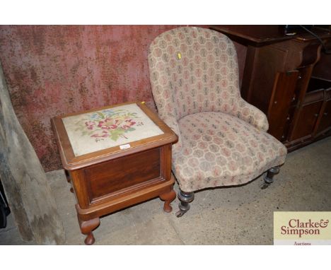 An upholstered nursing chair together with a commode 