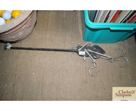 A vintage butlers shop game hook