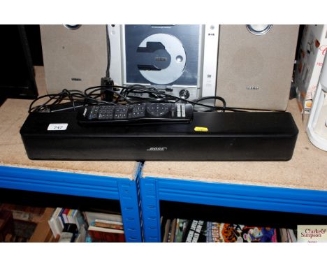 A Bose speaker and remote