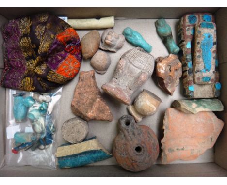 A quantity of Egyptian antiquities and other related items, including; two Shabti, a Greek terracotta oil lamp (7.5cm high), 