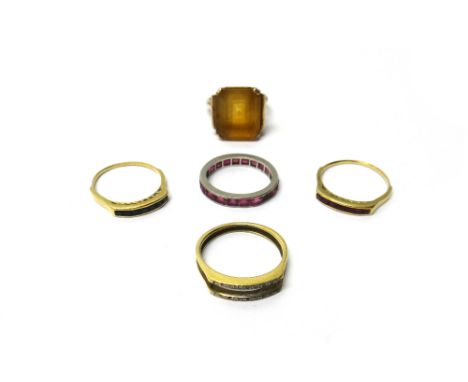 A diamond, ruby and sapphire set triple band combination ring, the central band mounted with two rows of small circular cut d