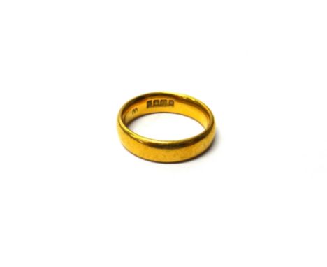 A 22ct gold plain wedding ring, ring size K, weight 6 gms.