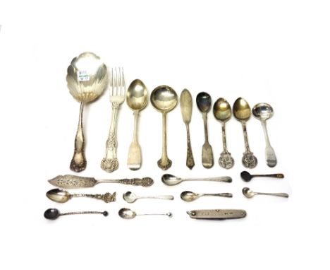 Silver flatware, comprising; two butter knives, four various spoons, eight condiment spoons and a dessert fork, a silver moun