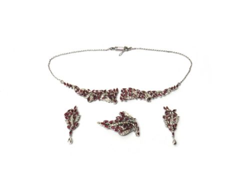 A ruby and diamond set necklace, two ruby and diamond set drops and a ruby and diamond set spray brooch, each mounted with ma