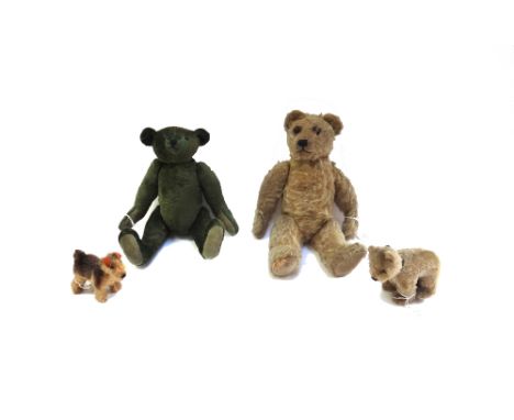 A Steiff style green teddy bear, with boot button eyes and jointed limbs, 33cm, together with another vintage teddy bear with