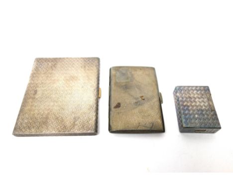 A Hermes Paris rectangular cigarette case, the exterior with engine turned decoration, a silver rectangular cigarette case, w