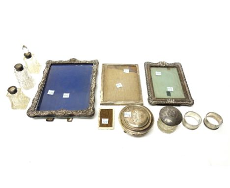 Silver and silver mounted wares, comprising; a circular hinge lidded trinket box, embossed with figures to the lid and raised