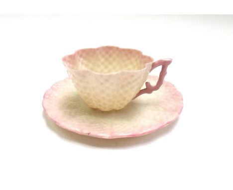 A Belleek porcelain part tea service, with black printed marks, of hob nail moulded form, with pink colouration, comprising; 