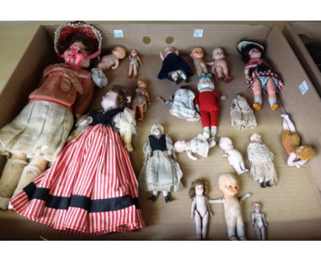 A quantity of miniature bisque porcelain dolls, mainly early 20th century, including 'Kewpie' type dolls, French and German e