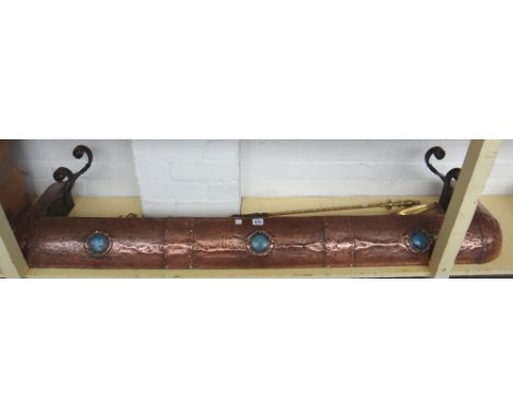 An Art Nouveau sheet copper and hardstone mounted fire curb, 156cm wide, and a set of three brass fire tools, the shovel 71cm