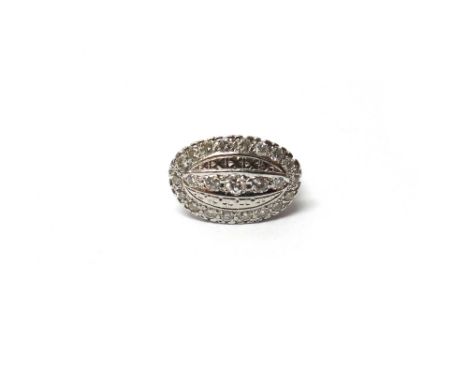 A white gold and diamond set ring, in an oval panel shaped design, mounted with a row of five circular cut diamonds at the ce