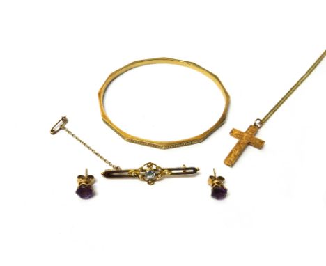 A pair of gold and amethyst set single stone ear studs, the backs with post and butterfly clip fittings, a 9ct gold bangle of