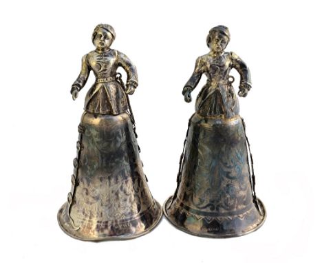 Two similar Dutch silver cups, each in the form of a Renaissance figure of a Turk with a moustache, with engraved decoration,
