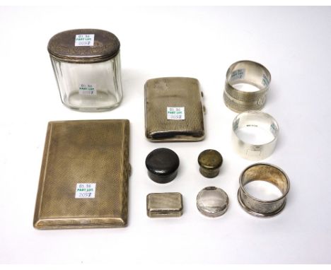Silver and silver mounted wares, comprising; two rectangular cigarette cases, having engine turned decoration, three napkin r