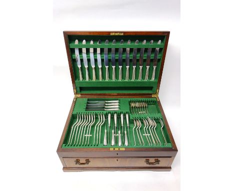 A canteen of silver Hanoverian pattern flatware,, comprising; twelve table knives, twelve dessert knives, eleven table forks,