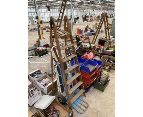 A BLUE SACK TRUCK WITH RUBBER WHEELS, A SIX RUNG VINTAGE WOODEN STEP LADDER AND A NON SLIP STEP LADDER 