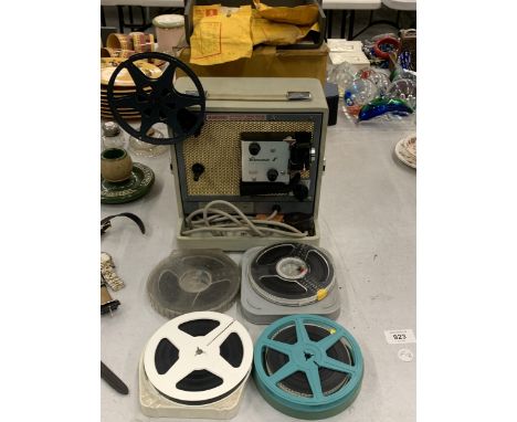 A BOXED KODAK BROWNIE 8 MM FILM PROJECTOR AND REELS 