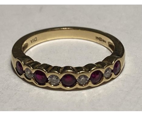 AN 18 CARAT GOLD RING WITH FOUR DIAMONDS AND FIVE RUBY IN LINE SIZE K 