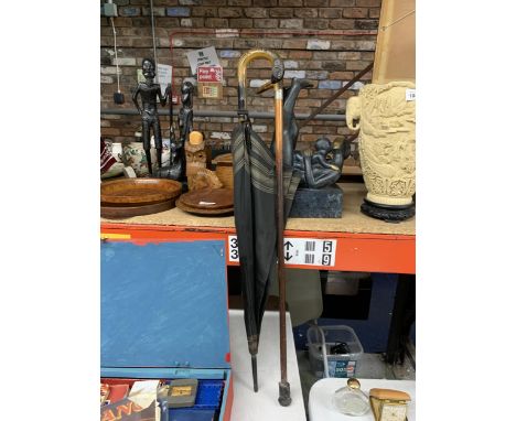 TWO ITEMS - A VINTAGE WALKING STICK AND AN UMBRELLA WITH BIRD DESIGN HANDLE 