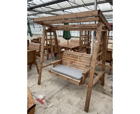 AN AS NEW EX DISPLAY CHARLES TAYLOR TWO SEATER SWING SEAT GARDEN ARBOUR *PLEASE NOTE VAT TO BE ADDED TO THE HAMMER PRICE ON T