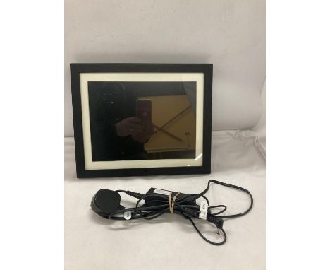 A POLAROID DIGITAL PICTURE FRAME 