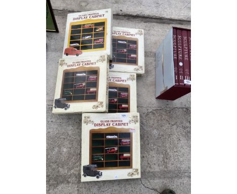 FIVE AS NEW AND BOXED GLASS FRONTED MODEL CAR DISPLAY UNITS 