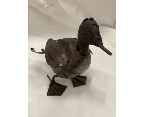 A METAL MODEL OF A DUCK 