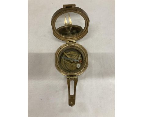 A POLISHED BRASS BRUNTON STYLE EXPLORERS' COMPASS 