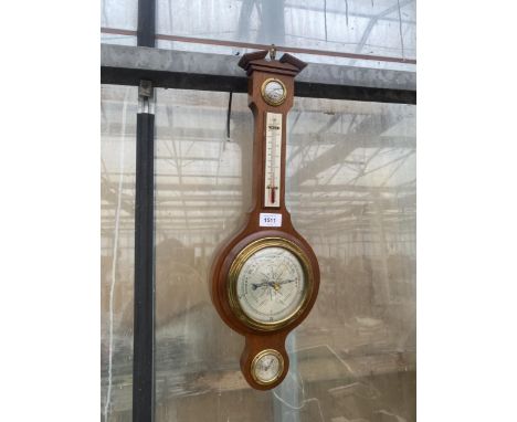 A VINTAGE OAK CASED WALL BAROMETER 