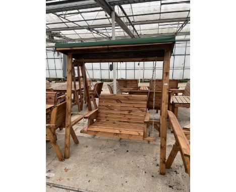 AN AS NEW EX DISPLAY CHARLES TAYLOR TWO SEATER SWING SEAT GARDEN ARBOUR *PLEASE NOTE VAT TO BE ADDED TO THE HAMMER PRICE ON T