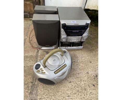 A SHARP STEREO SYSTEM WITH TWO SPEAKERS AND A MATSUI CD PLAYER 